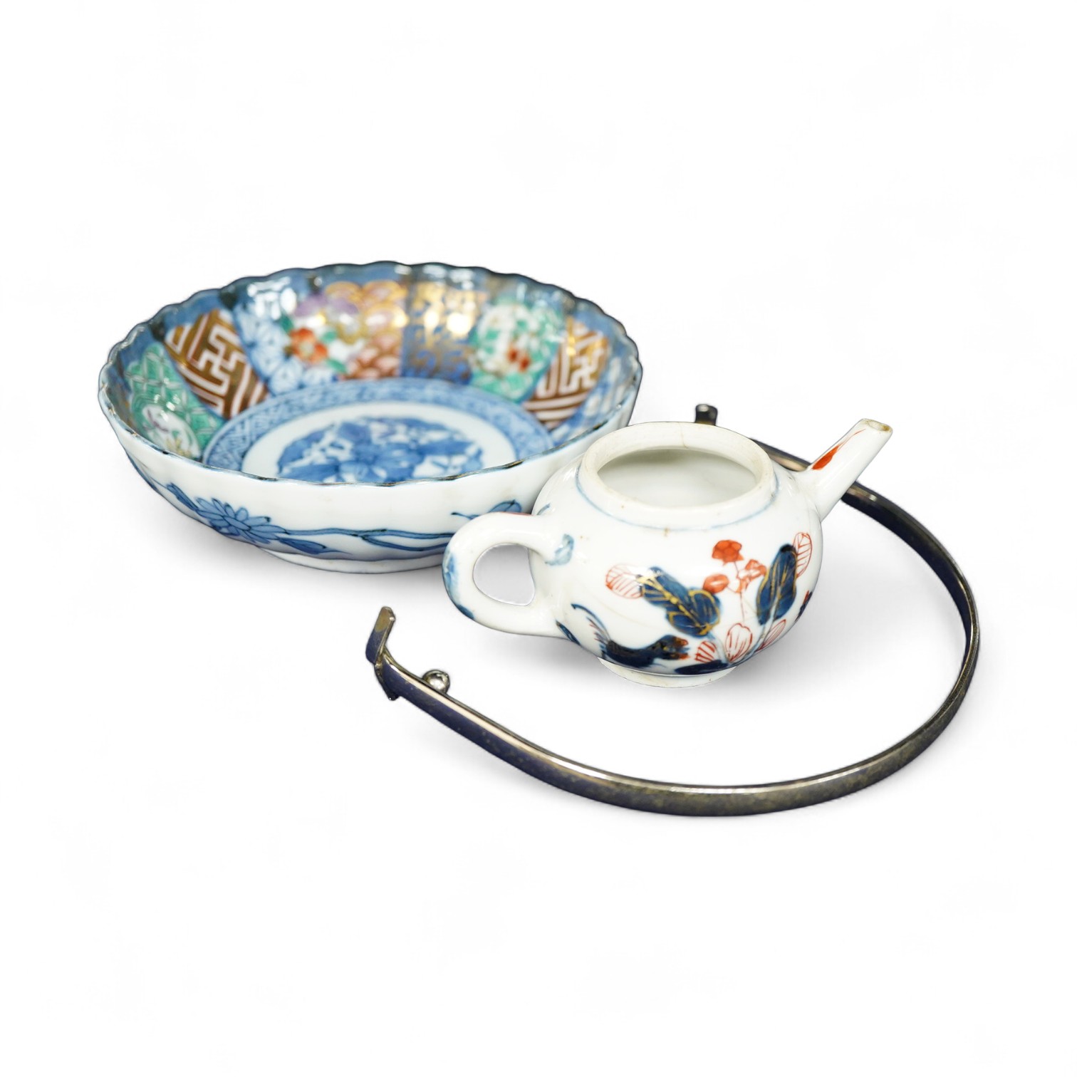 A Japanese Arita miniature teapot, late 17th century and a later dish, 13.5cm diameter